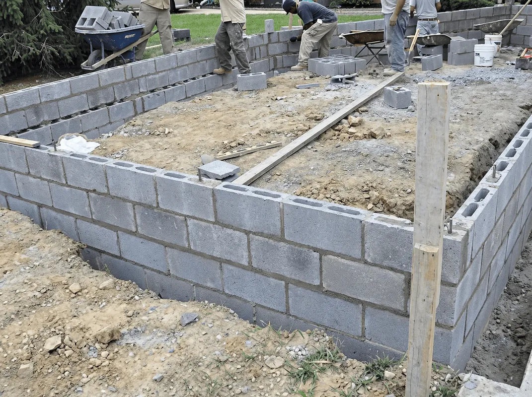 Professionals building a foundation with blocks in Stamford, CT